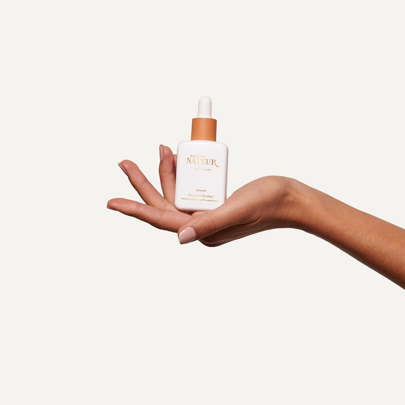 Buy Agent Nateur holi (sun) dewy tinted skin drops SPF50 in ALMOND - light to medium complexions at One Fine Secret. Official Stockist in Melbourne, Australia.