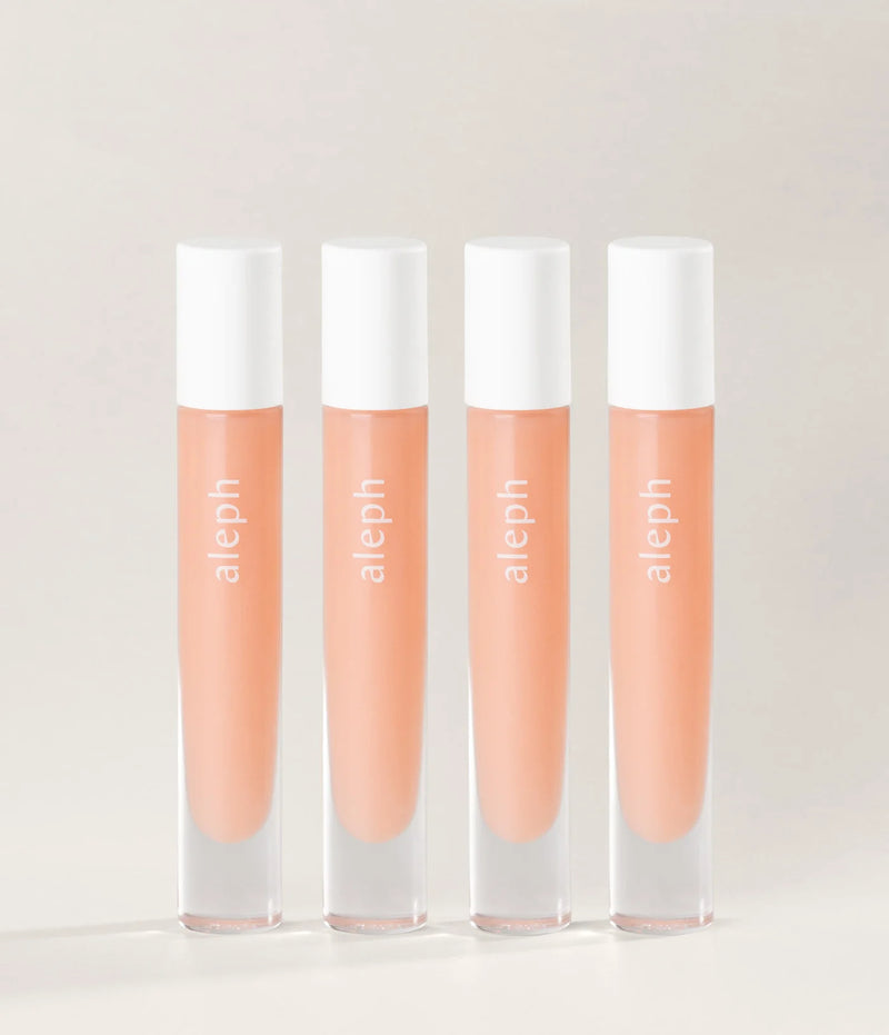 Buy Aleph Beauty Lucid Lip Gloss / Balm 8ml at One Fine Secret Clean Beauty.