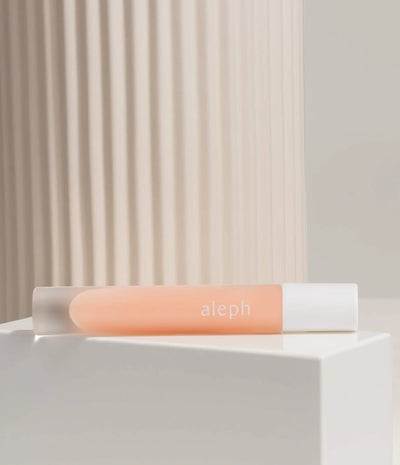Buy Aleph Beauty Lucid Lip Gloss / Balm 8ml at One Fine Secret Clean Beauty.