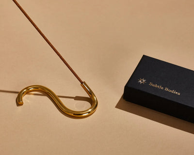 Buy Subtle Bodies Brass Incense Holder (i) S Shape at One Fine Secret Clean Beauty.