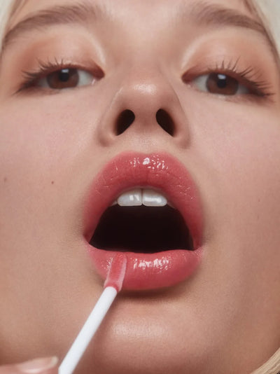 Buy Und Gretel KNUTZEN Lip Gloss in Apricot Shimmer colour at One Fine Secret.