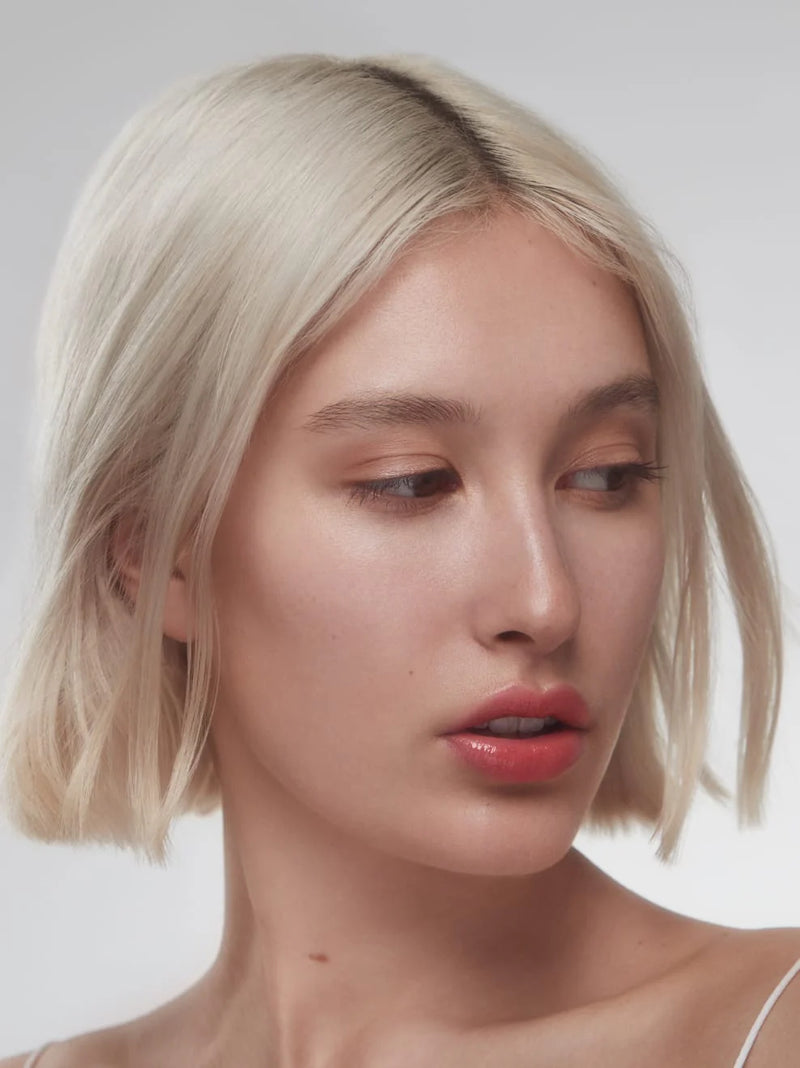 Buy Und Gretel KNUTZEN Lip Gloss in Apricot Shimmer colour at One Fine Secret.