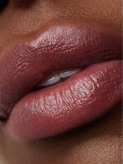 Buy Und Gretel TAGAROT Plumping Lip Balm in Acai colour at One Fine Secret.